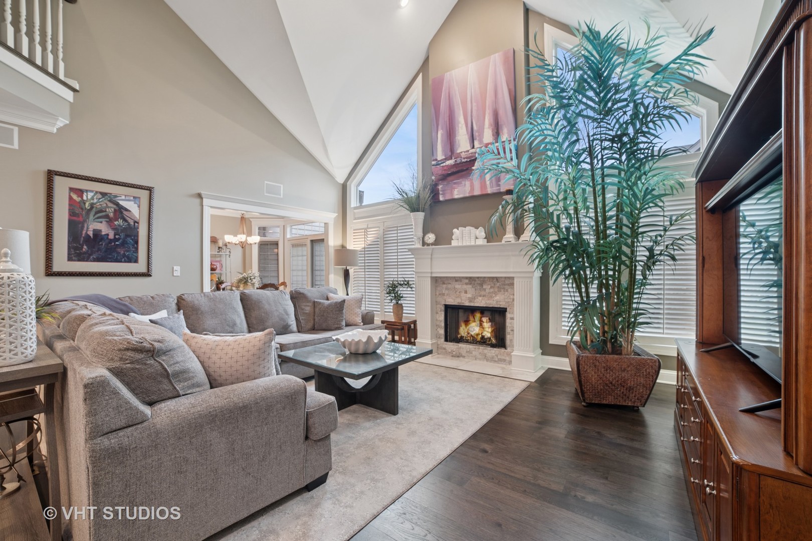 1829 Rizzi Lane Bartlett, IL 60103 - Photo 11 of 37 a living room with furniture and a fireplace