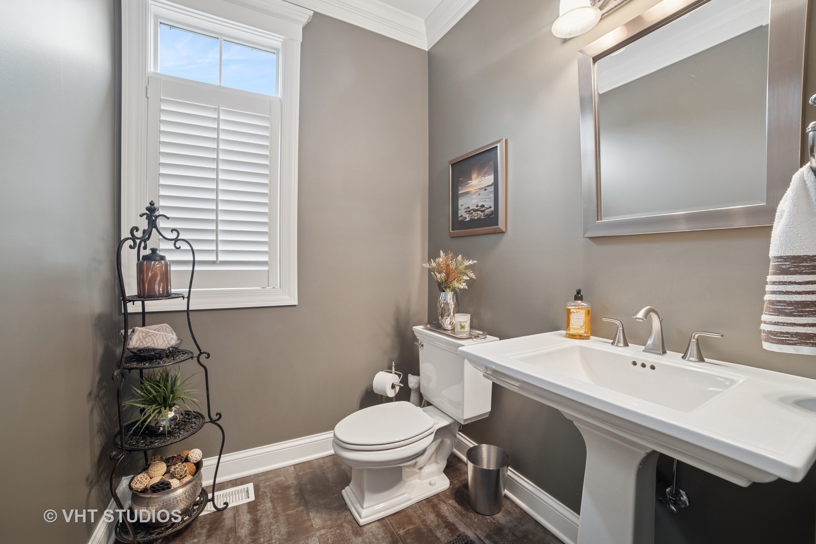 1829 Rizzi Lane Bartlett, IL 60103 - Photo 5 of 37 a bathroom with a sink toilet and mirror