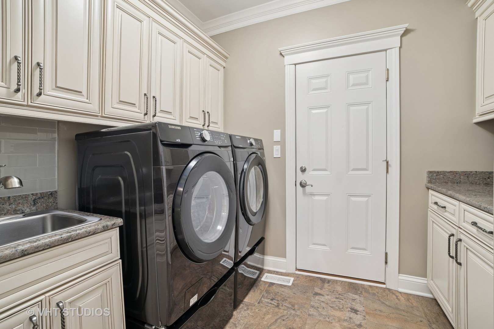 1829 Rizzi Lane Bartlett, IL 60103 - Photo 8 of 37 a utility room with dryer and washer