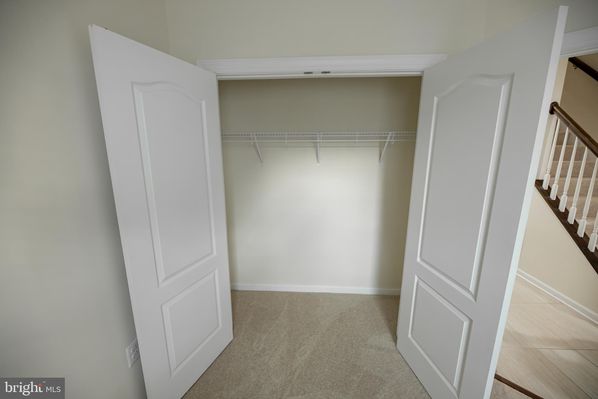 7386 Riding Meadow Way Manassas, VA 20111 - Photo 4 of 8 an empty room with windows