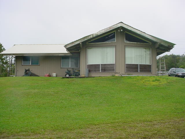 52 Hoaka Road Hilo, HI 96720 - Photo 2 of 11 a front view of house with a garden