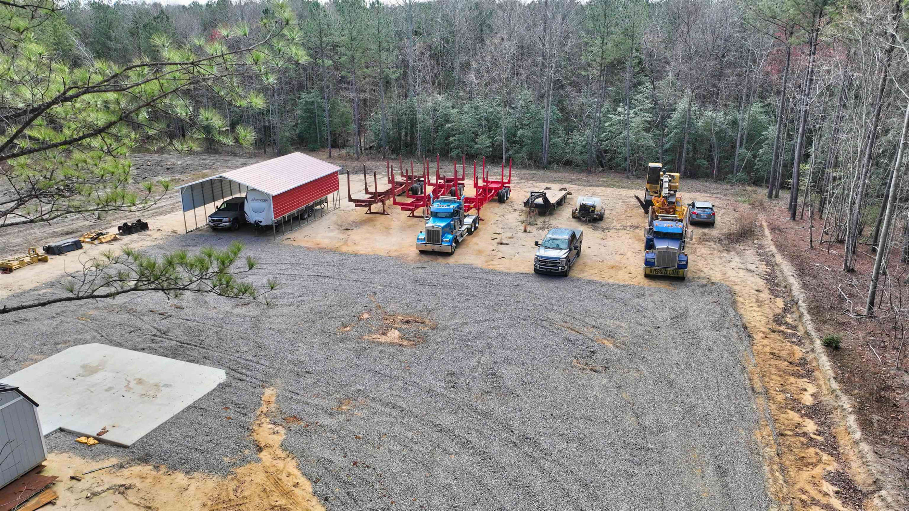 1555 Stallings Mill Road Spring Hope, NC 27882 - Photo 6 of 27 a view of a and a car in a backyard