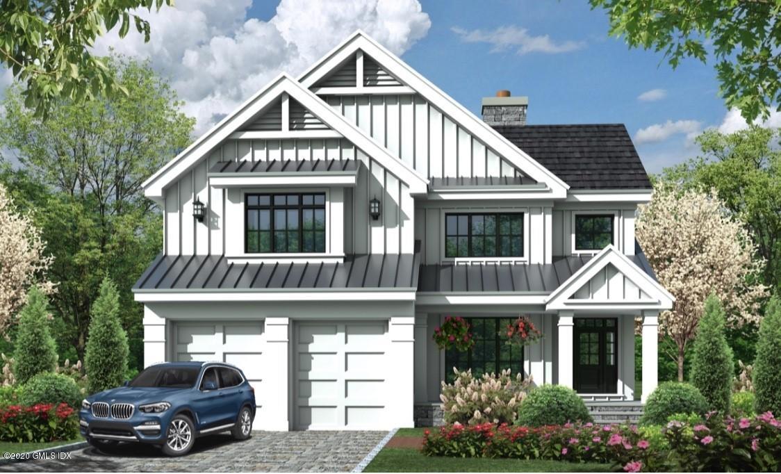 5 Chapel Lane Riverside, CT 06878 - Photo 2 of 46 a front view of a house with garden