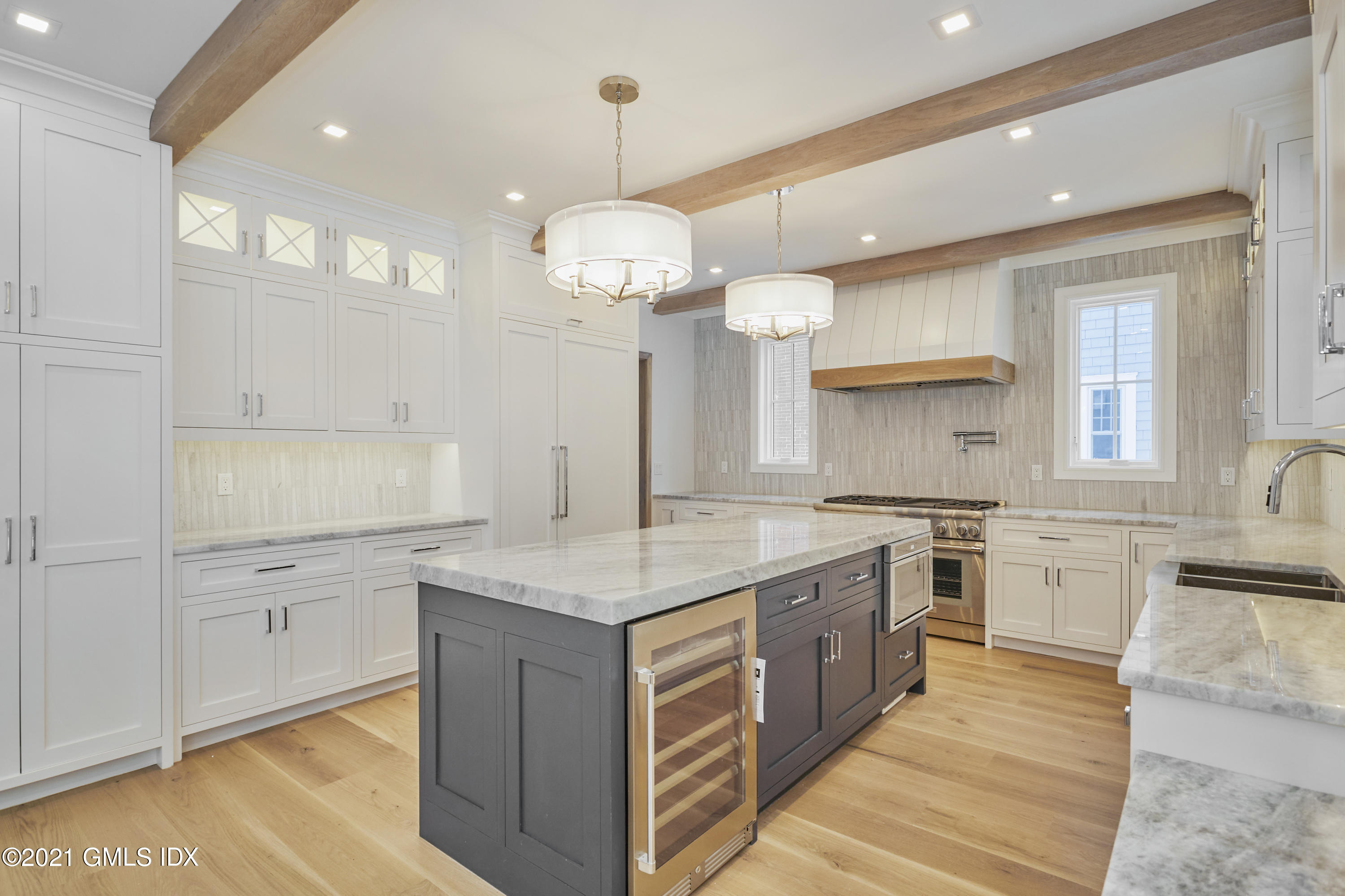 5 Chapel Lane Riverside, CT 06878 - Photo 23 of 46 a open kitchen with a sink stove and wooden floor