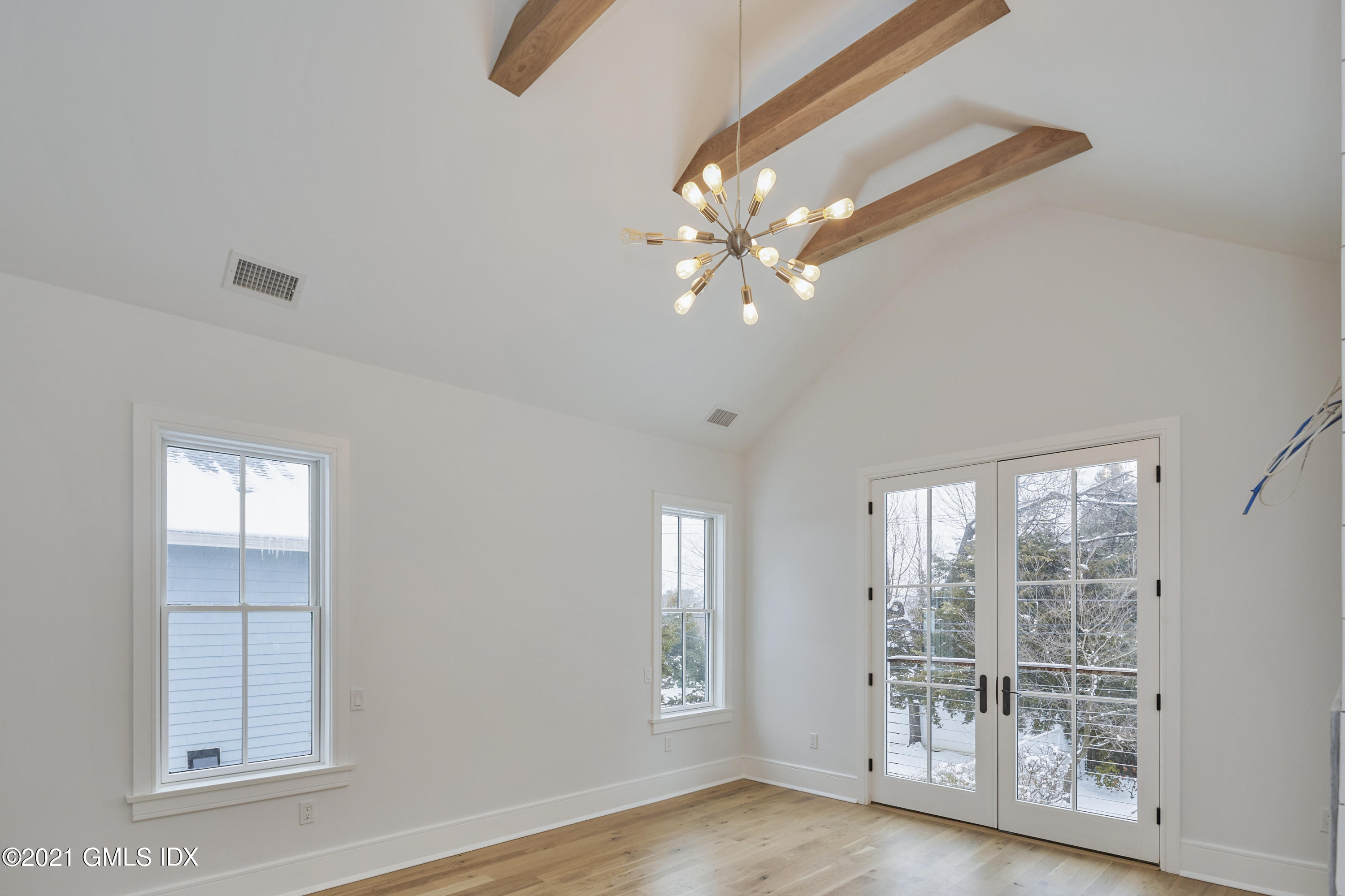 5 Chapel Lane Riverside, CT 06878 - Photo 33 of 46 wooden floor in an empty room with a window