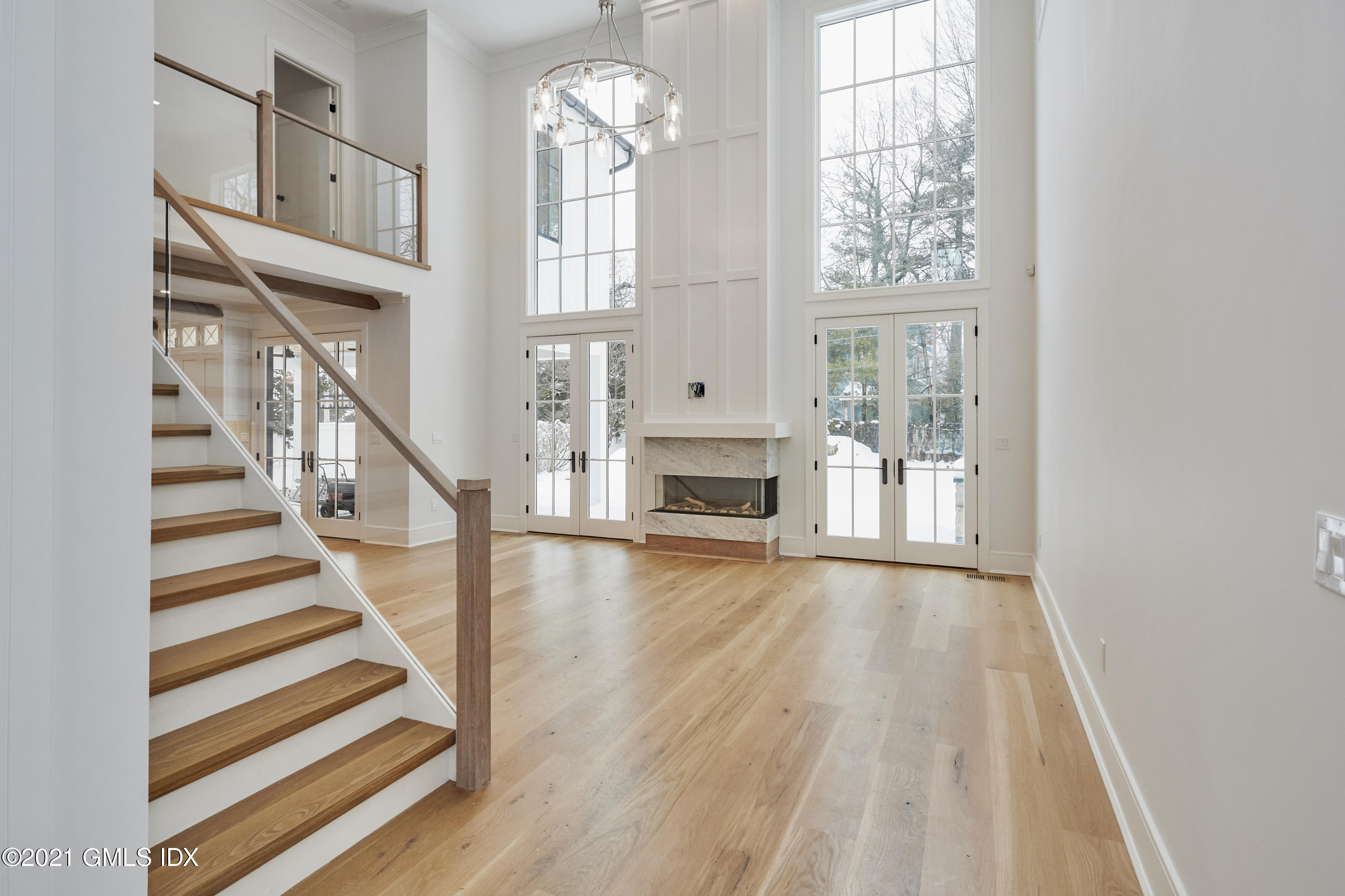 5 Chapel Lane Riverside, CT 06878 - Photo 5 of 46 a view of an entryway with wooden floor