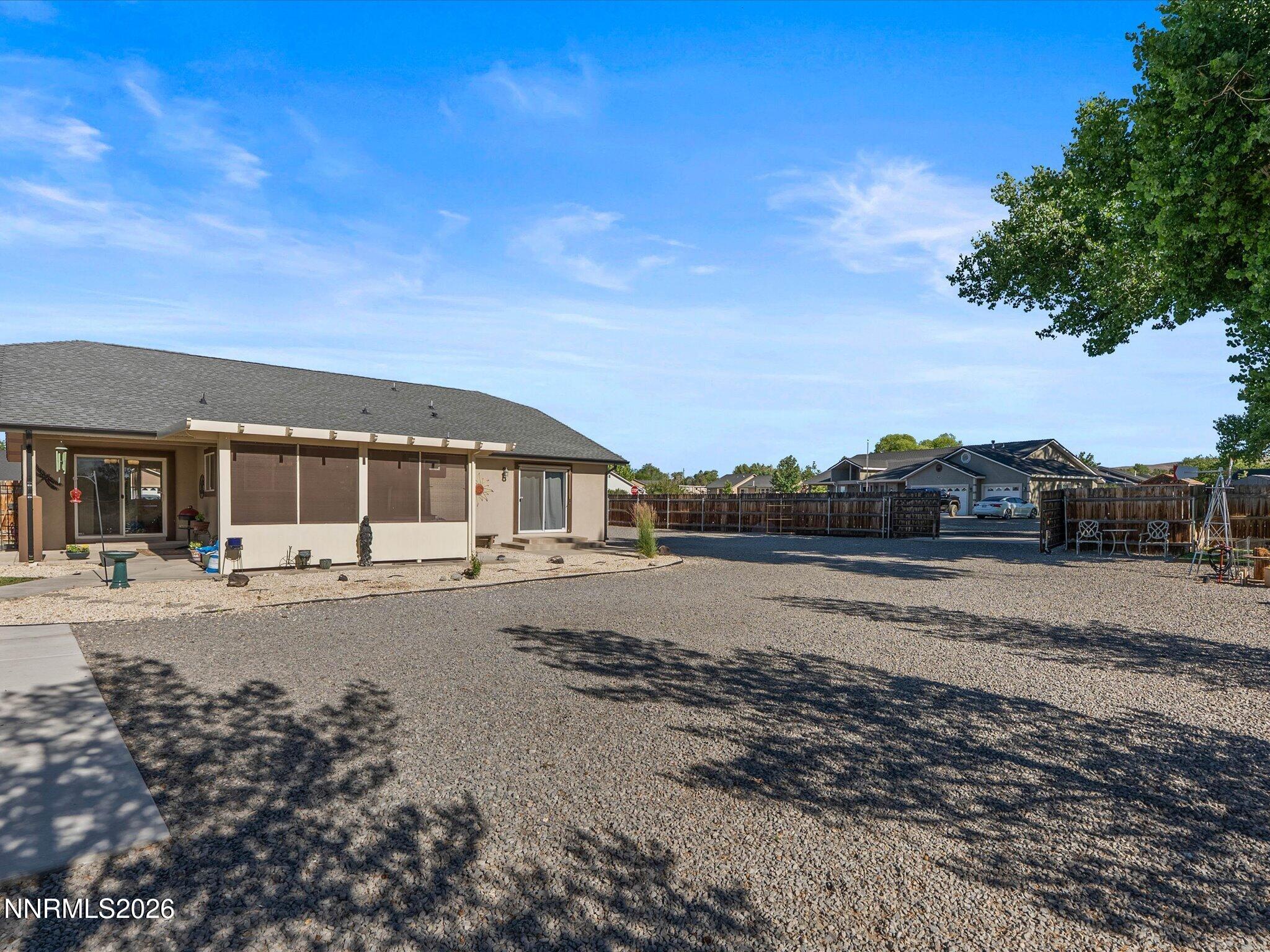 1080 Red Rock Road Fernley, NV 89408 - Photo 45 of 45 a front view of a house with a yard