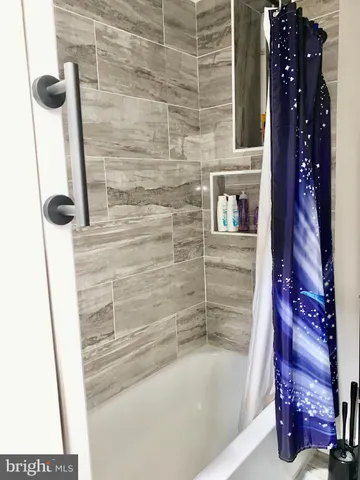 a bathroom with a bathtub