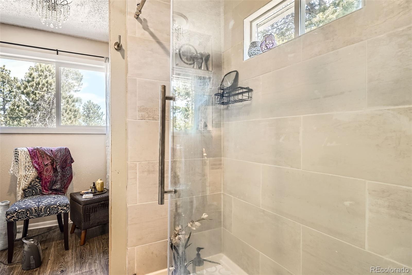 33 L Road Golden, CO 80403 - Photo 19 of 49 a bathroom with a bathtub and shower