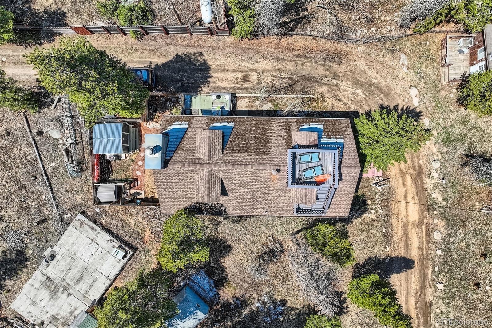 33 L Road Golden, CO 80403 - Photo 41 of 49 a aerial view of a house with large trees