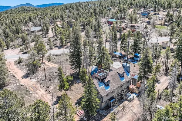 an aerial view of a city with lots of residential buildings