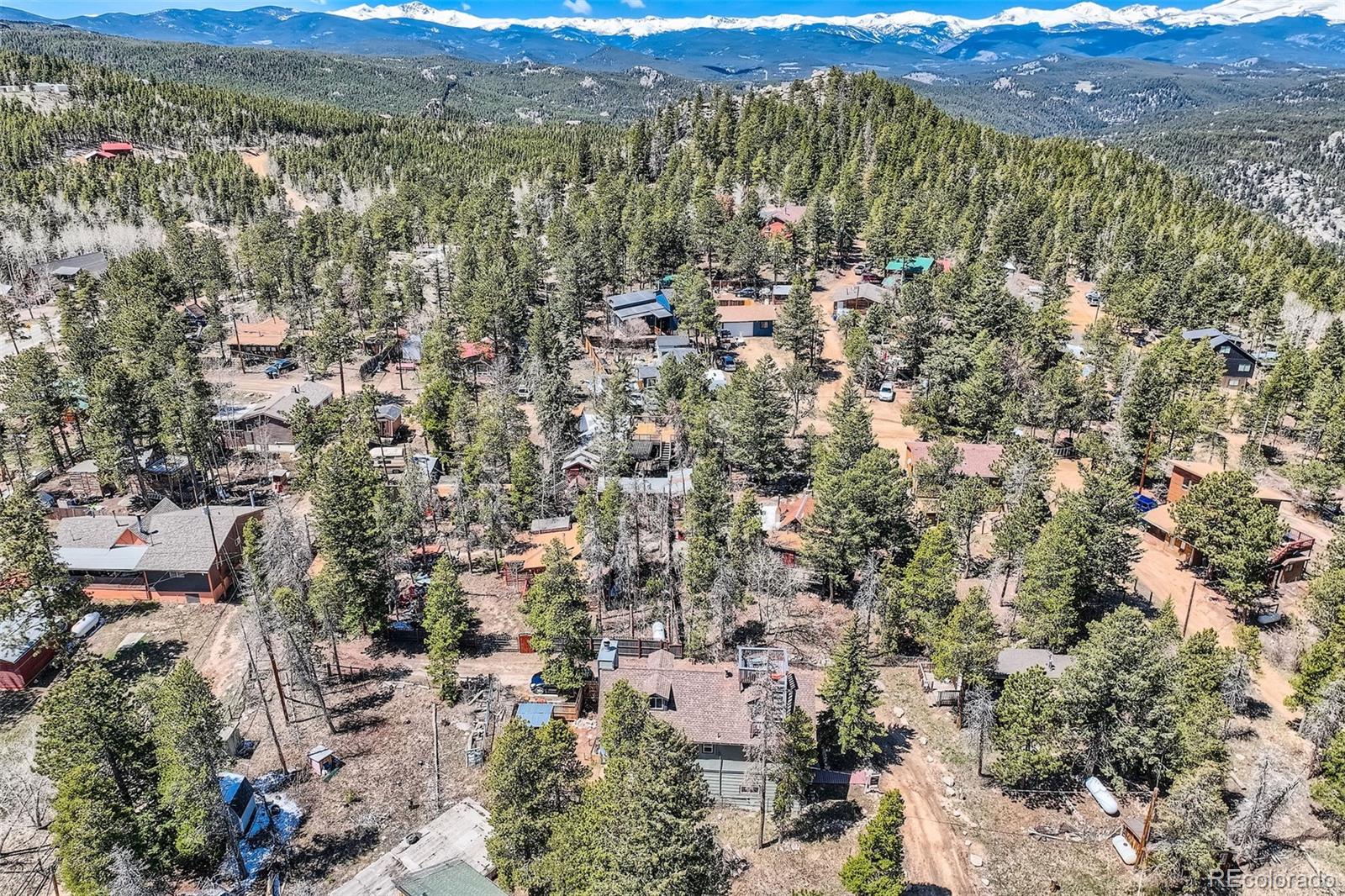 33 L Road Golden, CO 80403 - Photo 46 of 49 an aerial view of residential house with parking and trees