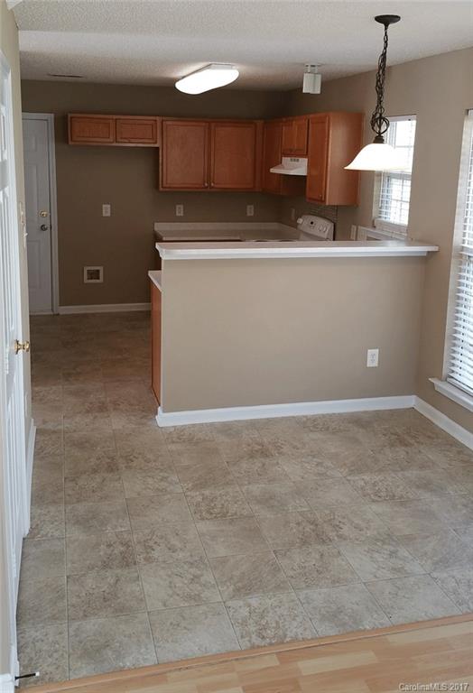 11203 Gold Pan Road Charlotte, NC 28215 - Photo 6 of 15 a view of a kitchen with a sink