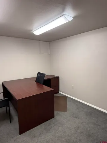 a room with a table and a chair