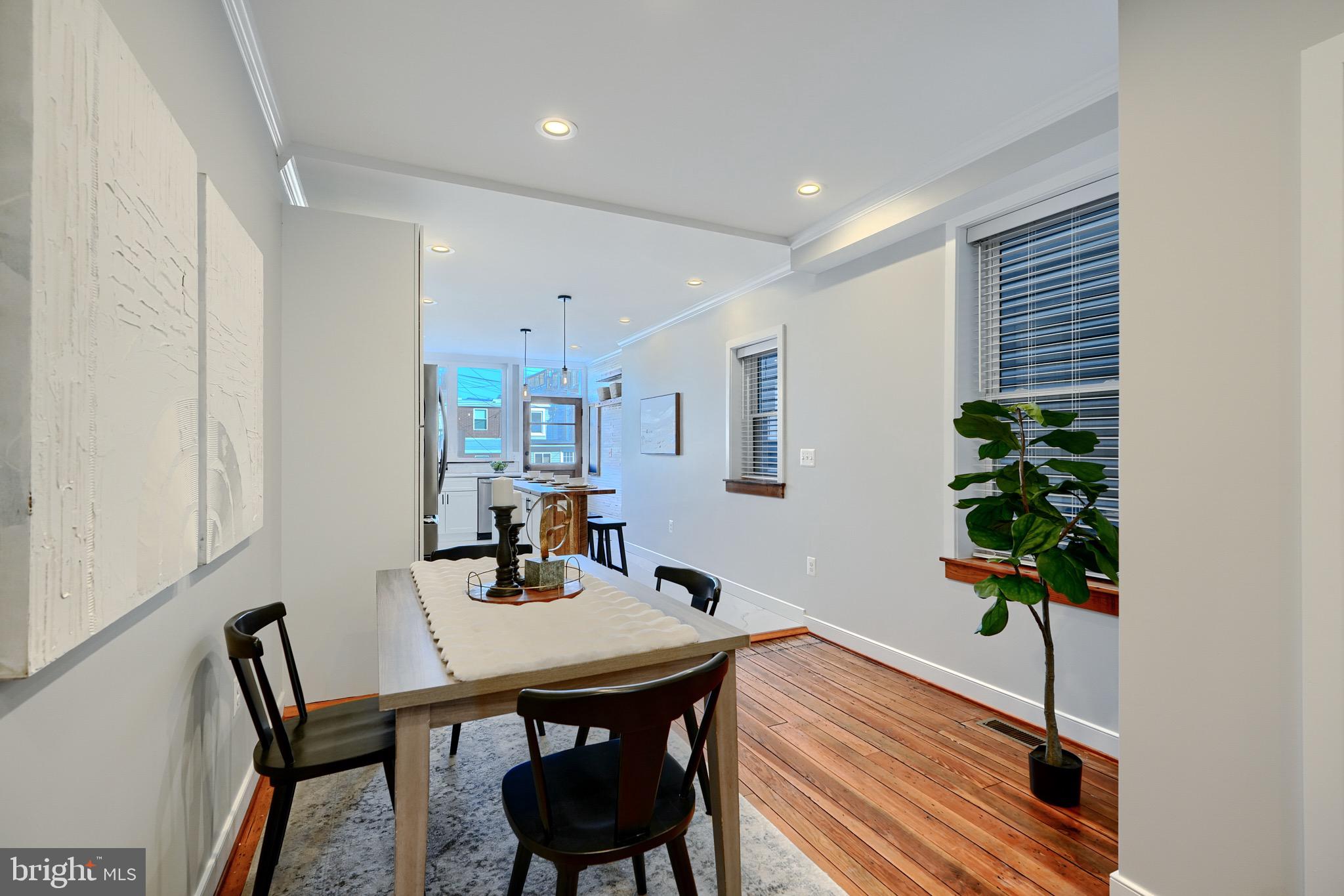 1435 Riverside Avenue Baltimore, MD 21230 - Photo 21 of 78 a view of a dining room with furniture and wooden floor