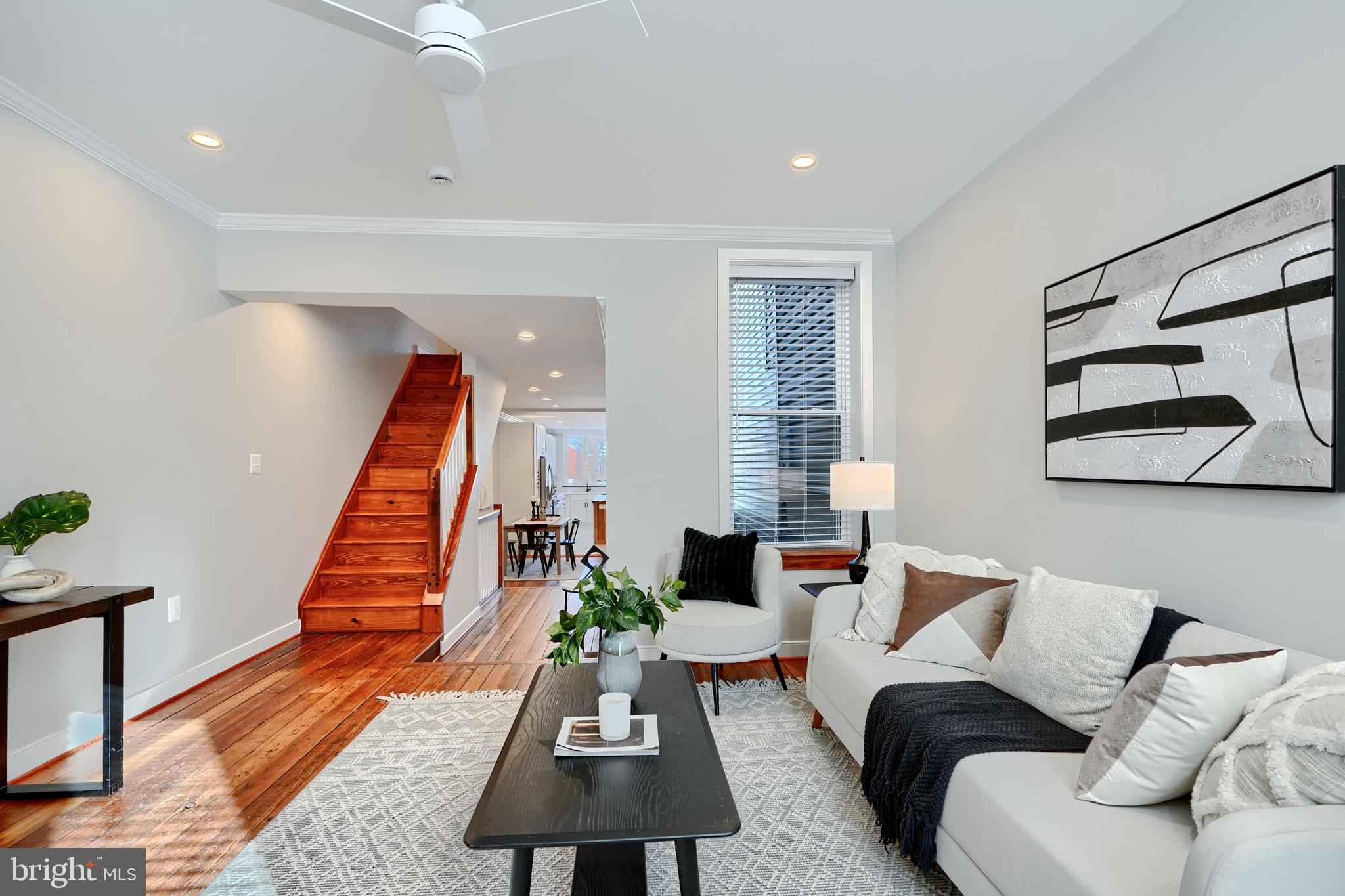 1435 Riverside Avenue Baltimore, MD 21230 - Photo 23 of 78 a living room with furniture and a wooden floor