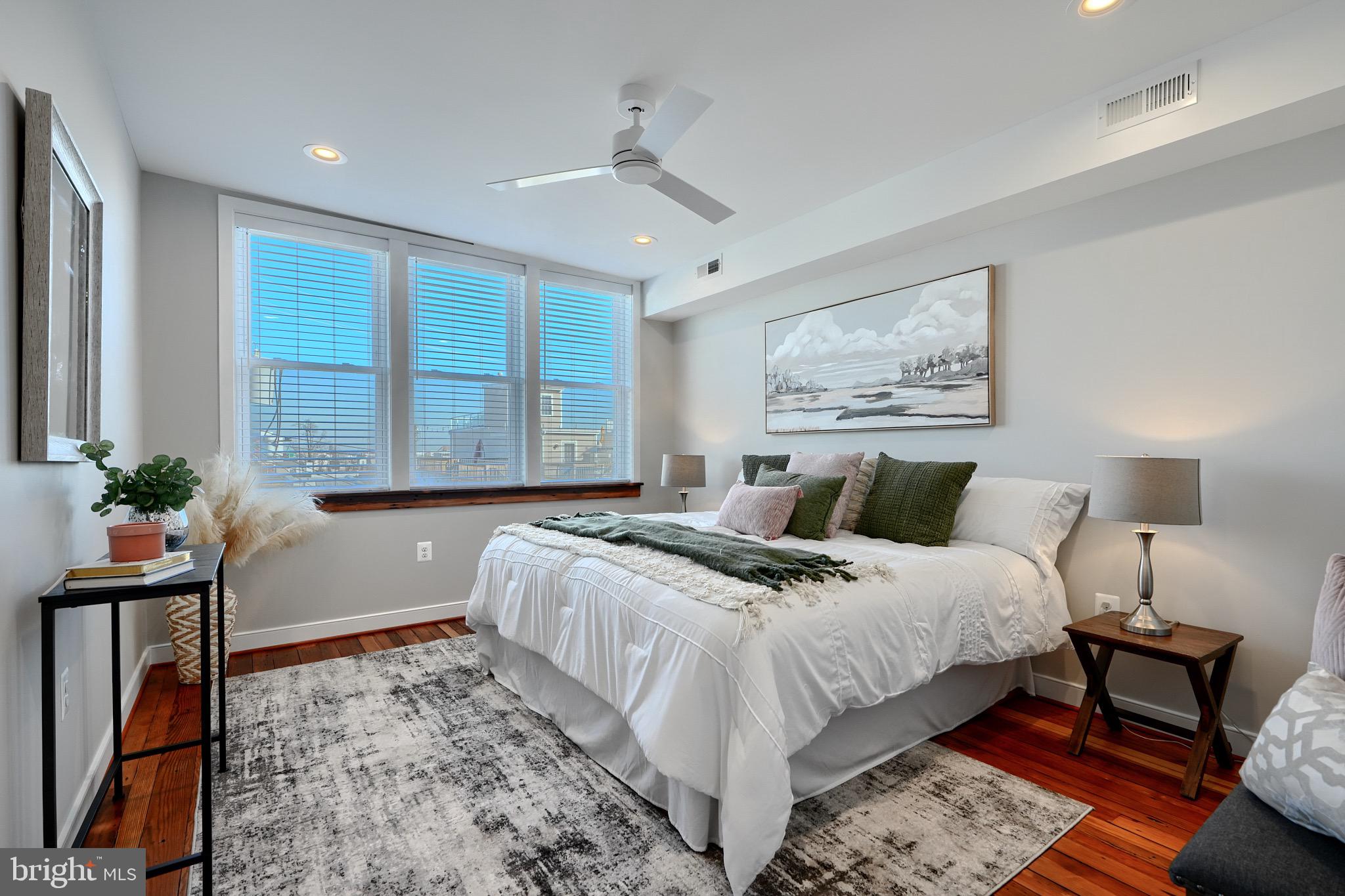 1435 Riverside Avenue Baltimore, MD 21230 - Photo 32 of 78 a bedroom with a large bed and a window