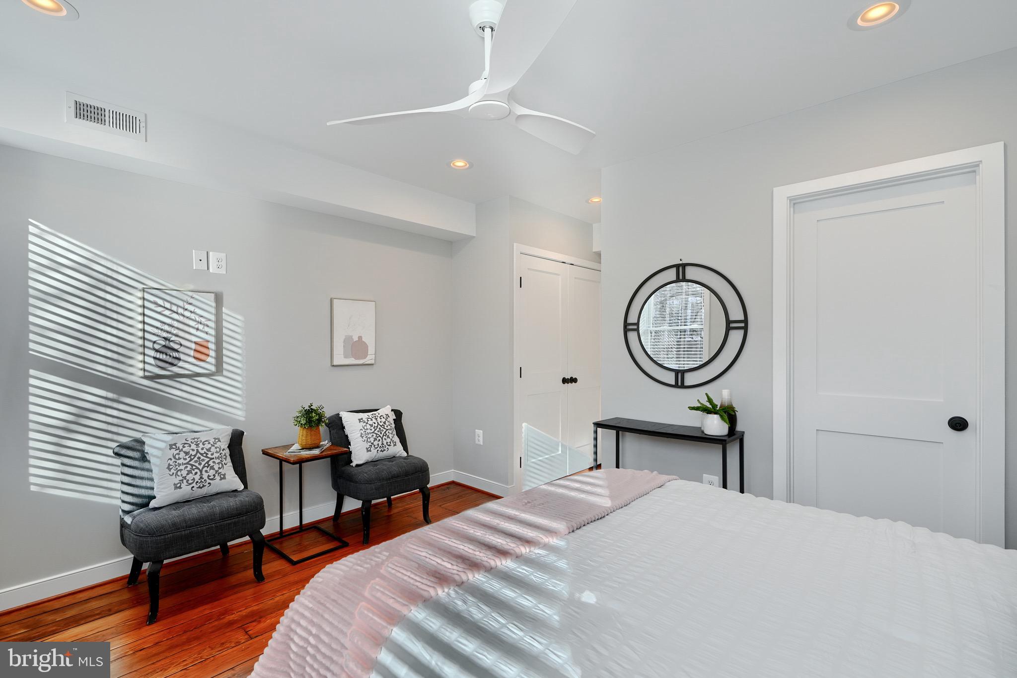 1435 Riverside Avenue Baltimore, MD 21230 - Photo 42 of 78 a bedroom with bed and wooden floor