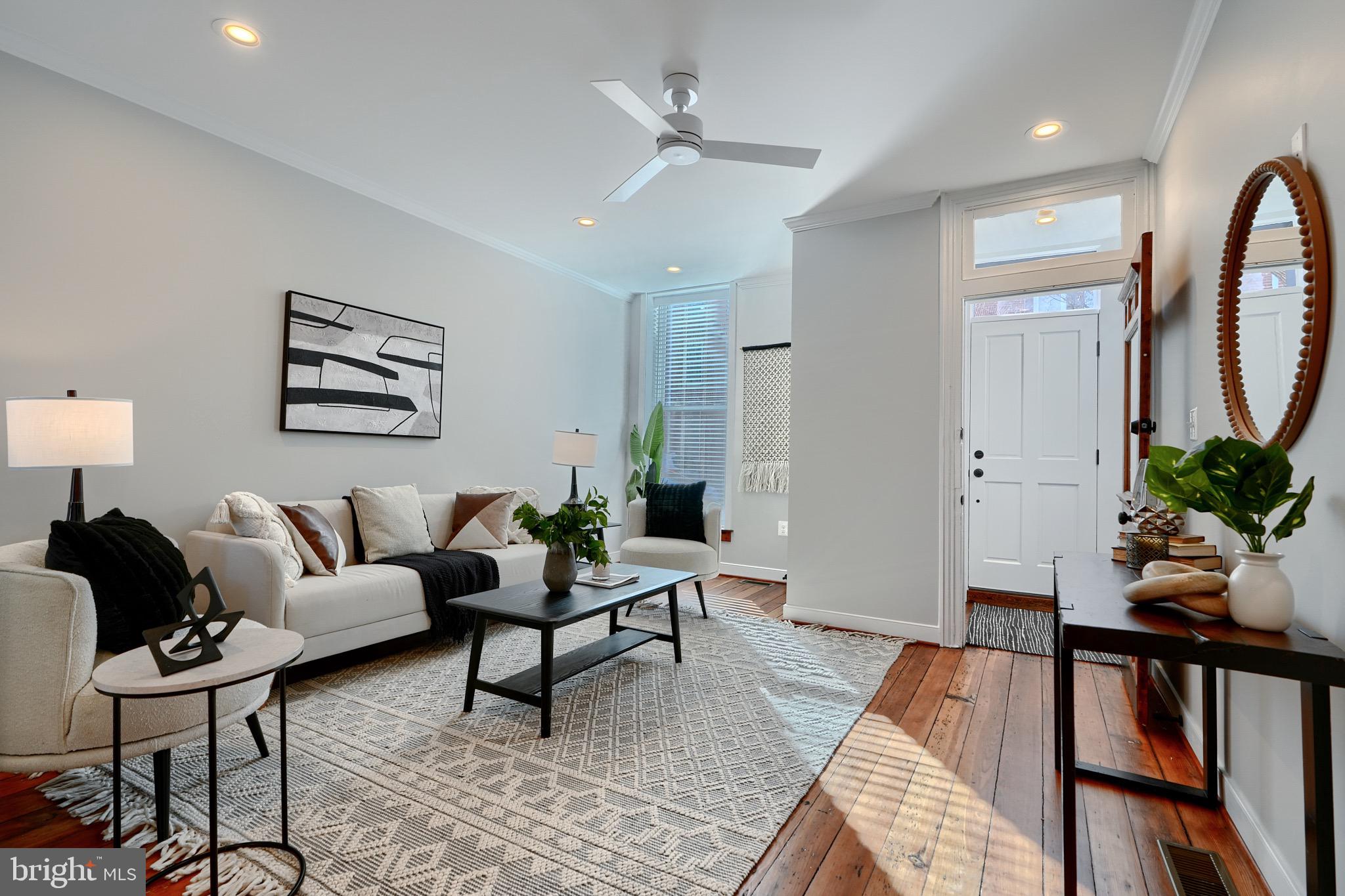 1435 Riverside Avenue Baltimore, MD 21230 - Photo 5 of 78 a living room with furniture and wooden floor