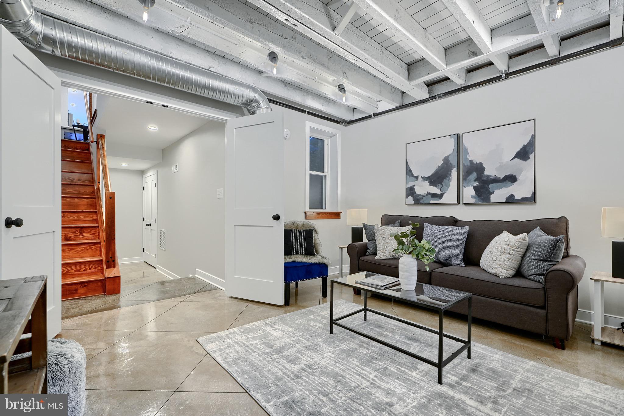 1435 Riverside Avenue Baltimore, MD 21230 - Photo 60 of 78 a living room with furniture and wooden floor