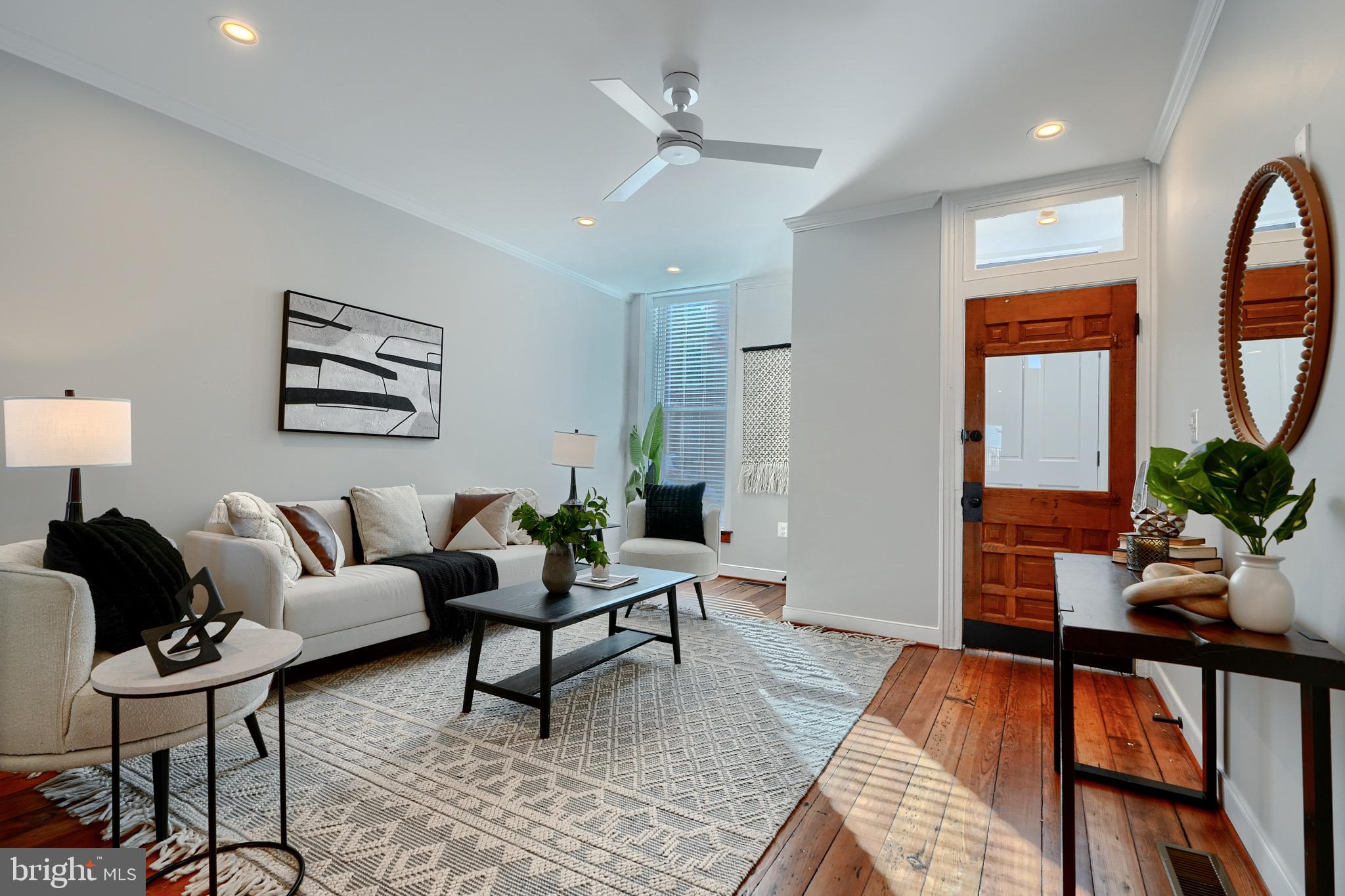 1435 Riverside Avenue Baltimore, MD 21230 - Photo 7 of 78 a living room with furniture and a window