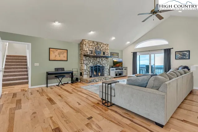a bathroom with a sink vanity mirror and toilet