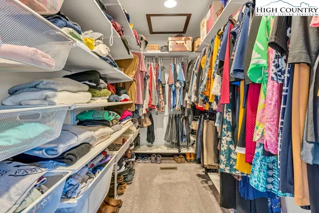 a view of house with yard and ocean view