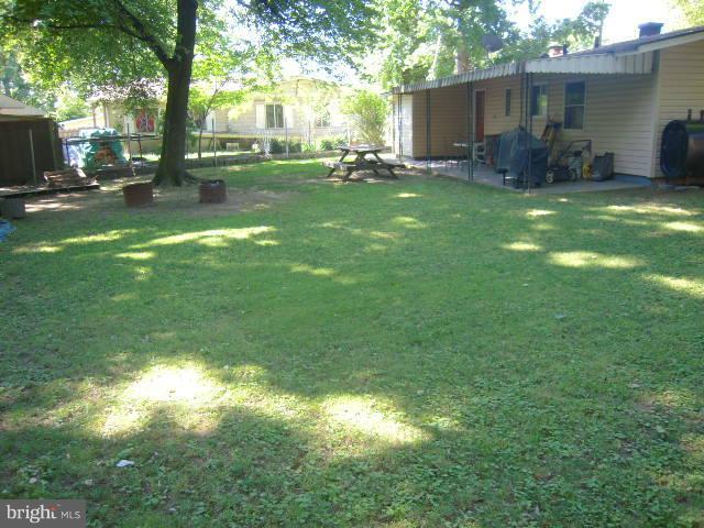 13725 Joyce Road Woodbridge, VA 22191 - Photo 18 of 24 Large, Fenced Backyard
