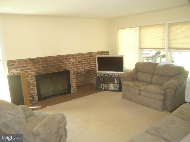 13725 Joyce Road Woodbridge, VA 22191 - Photo 10 of 24 Living Room with Fireplace