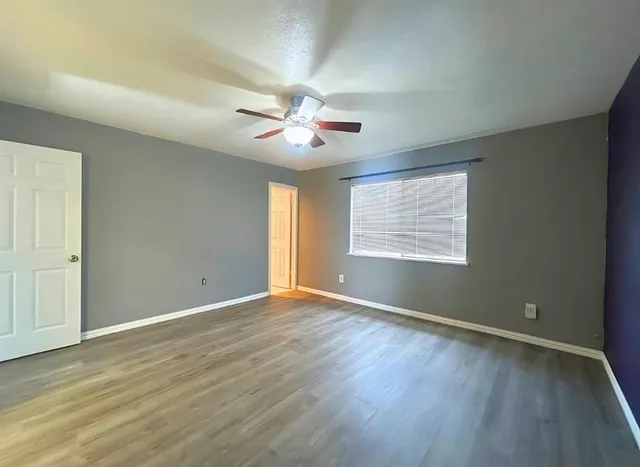 a room that has a rug and a chair in it