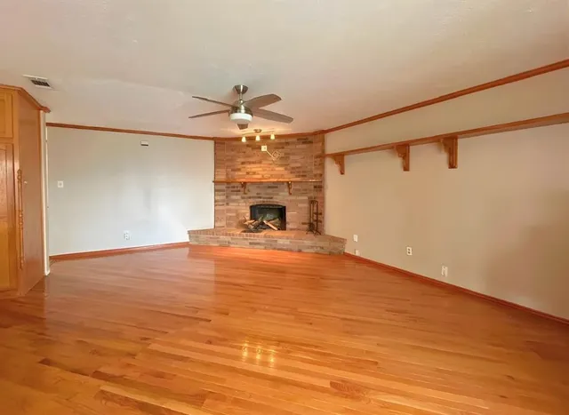 a large room with wooden floor