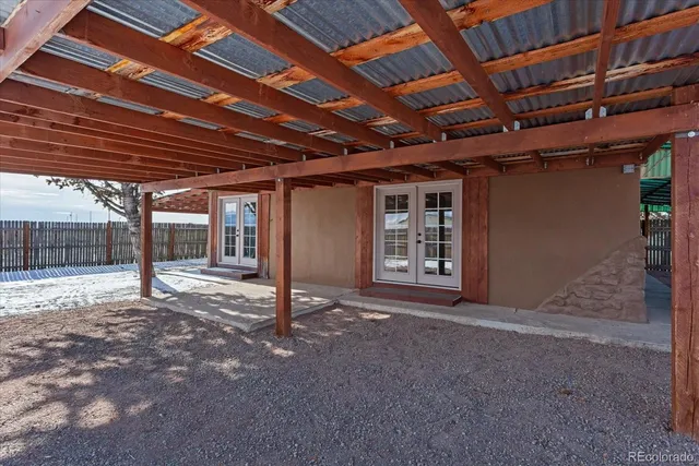 a view of a room with wooden walls
