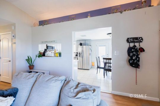 632 South Gordon Street Ridgecrest, CA 93555 - Photo 9 of 30 a bedroom with a bed and a couch