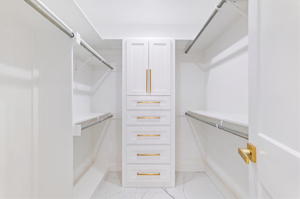 5407 Westgrove Drive Dallas, TX 75248 - Photo 25 of 40 a view of walk in closet