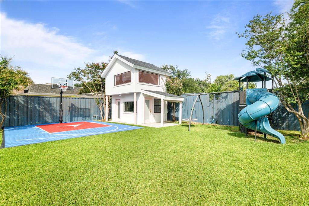 5407 Westgrove Drive Dallas, TX 75248 - Photo 38 of 40 a view of a house with a yard and sitting area