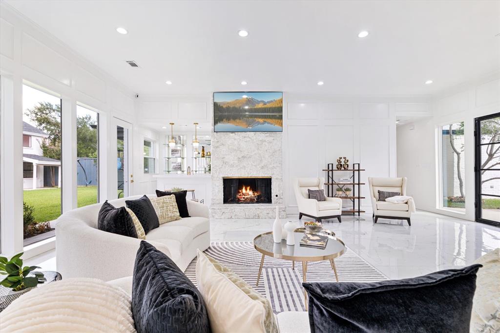 5407 Westgrove Drive Dallas, TX 75248 - Photo 6 of 40 a living room with furniture and a fireplace