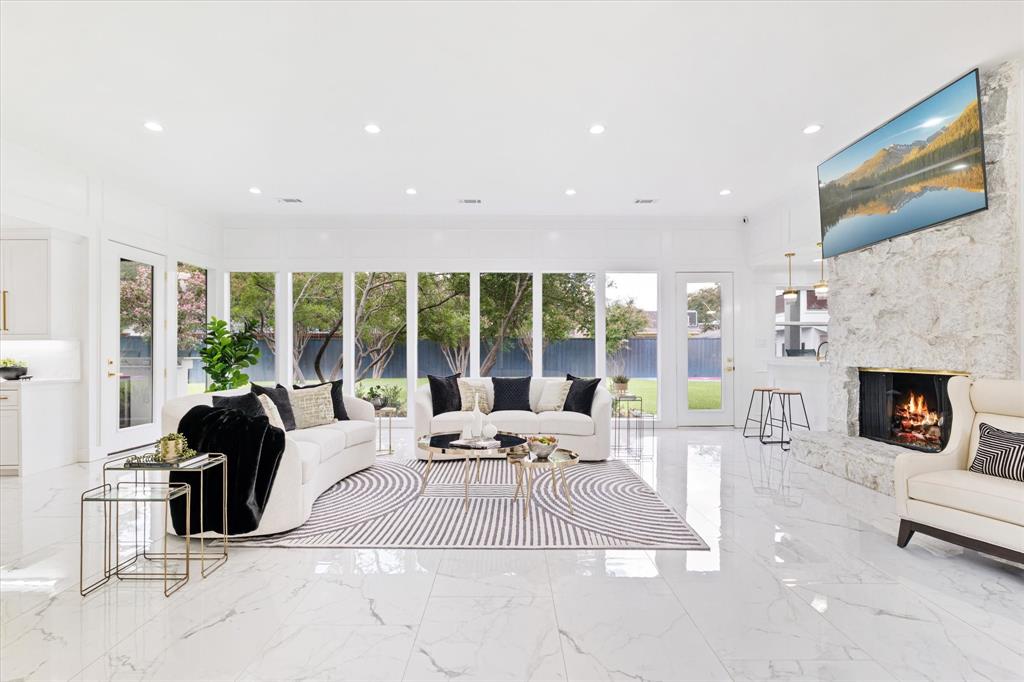 5407 Westgrove Drive Dallas, TX 75248 - Photo 7 of 40 a living room with furniture large window and a fireplace
