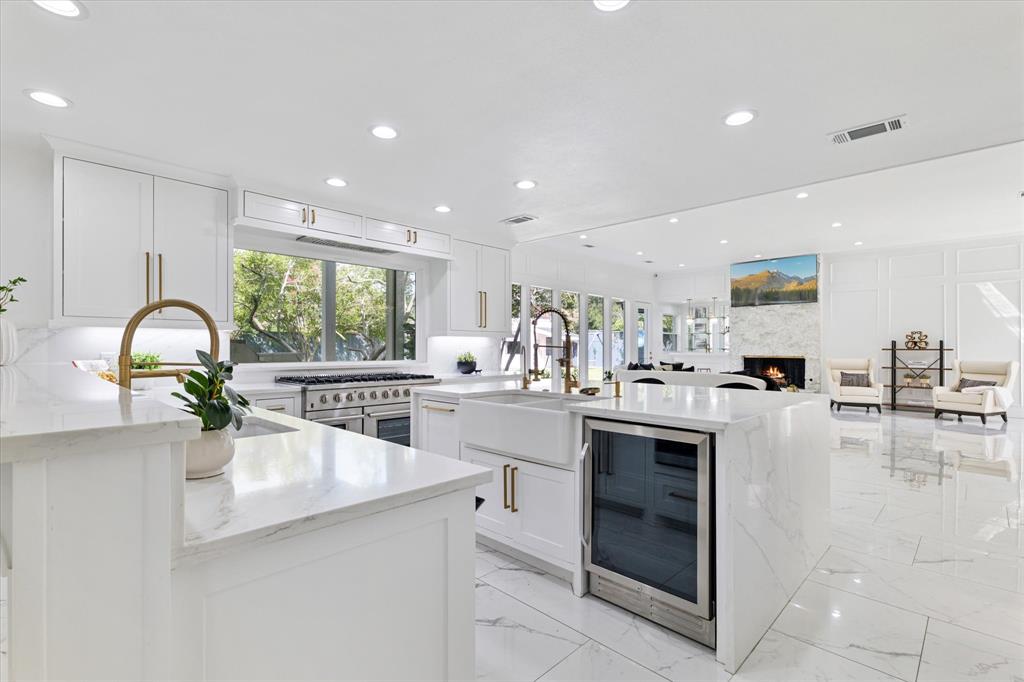 5407 Westgrove Drive Dallas, TX 75248 - Photo 10 of 40 a kitchen with counter top space and living room