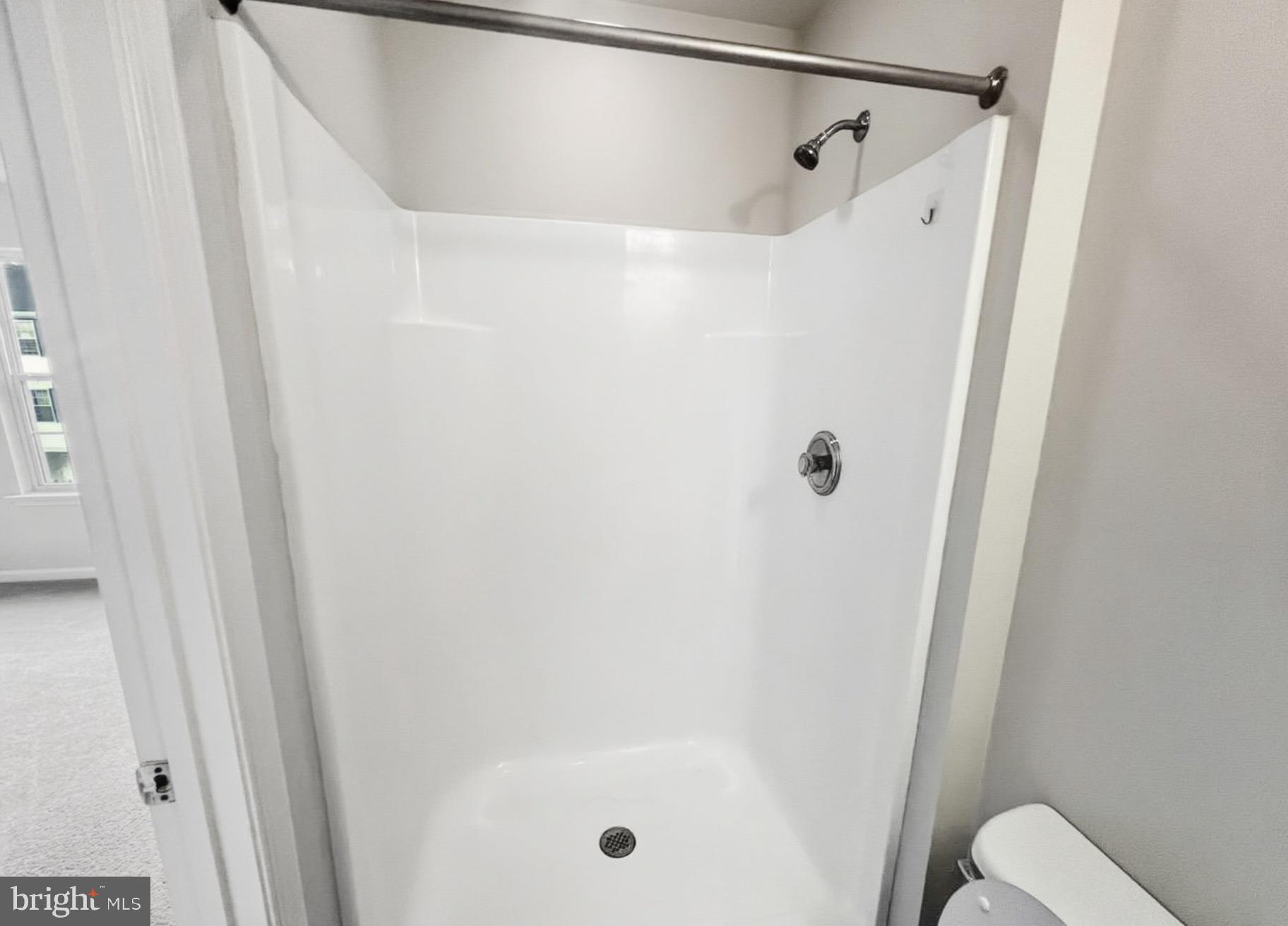 3607 Harbor Road Chesapeake Beach, MD 20732 - Photo 11 of 27 a bathroom with a shower