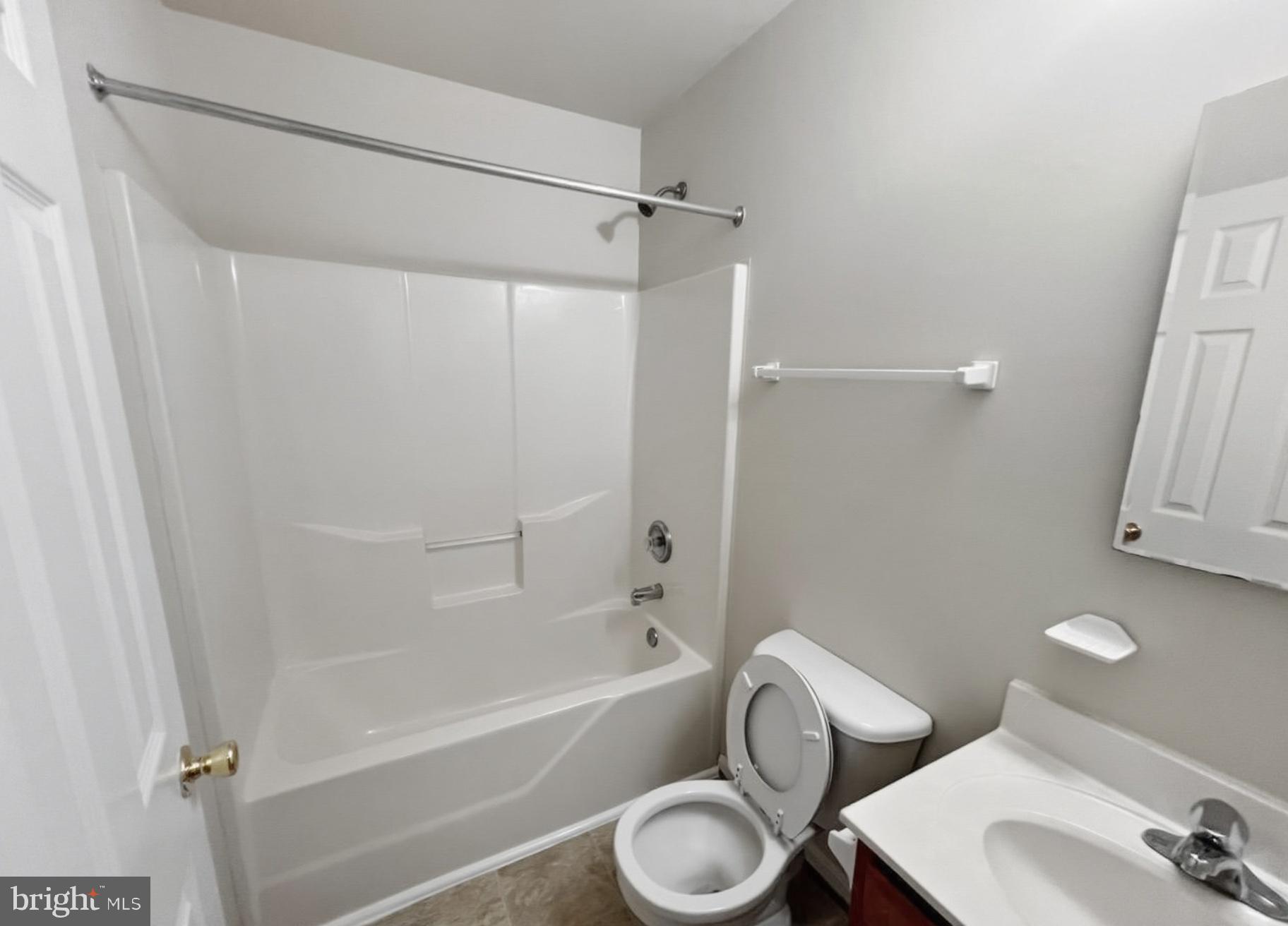 3607 Harbor Road Chesapeake Beach, MD 20732 - Photo 14 of 27 a bathroom with a toilet and a tub