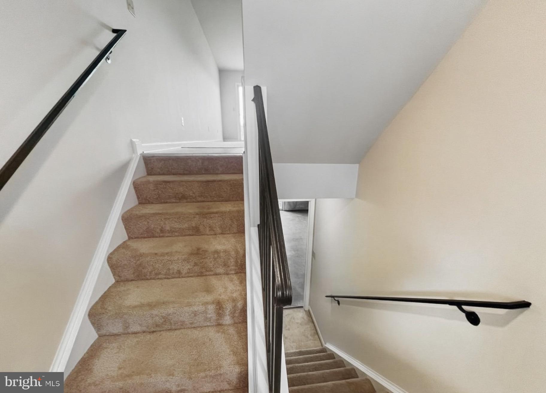 3607 Harbor Road Chesapeake Beach, MD 20732 - Photo 23 of 27 a view of staircase with white walls