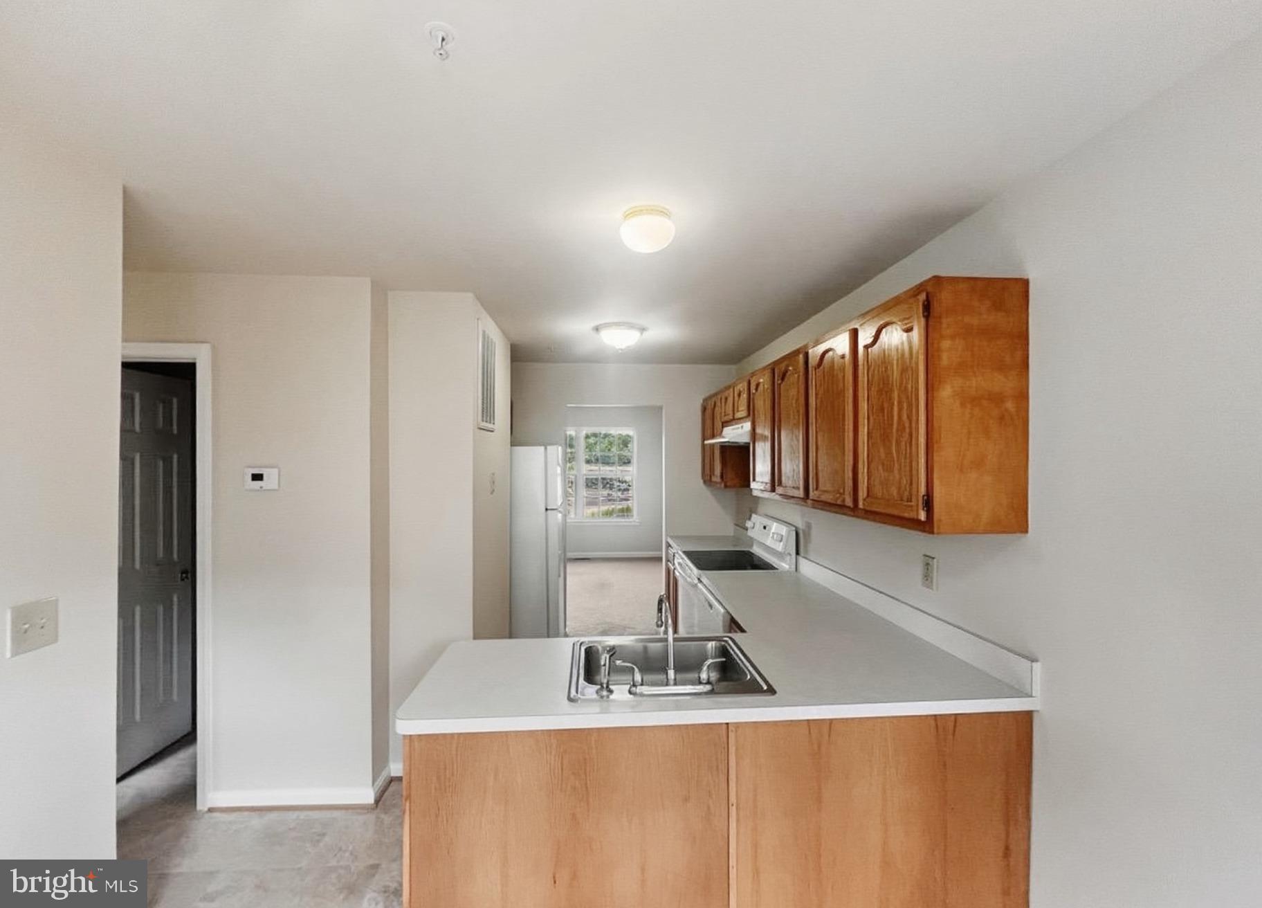 3607 Harbor Road Chesapeake Beach, MD 20732 - Photo 4 of 27 a bathroom with a sink and a mirror