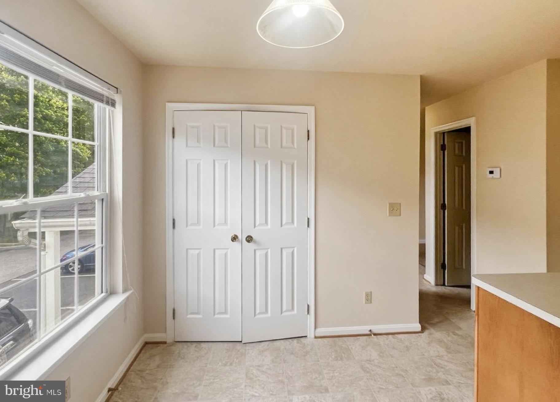 3607 Harbor Road Chesapeake Beach, MD 20732 - Photo 5 of 27 an empty room with windows and closet