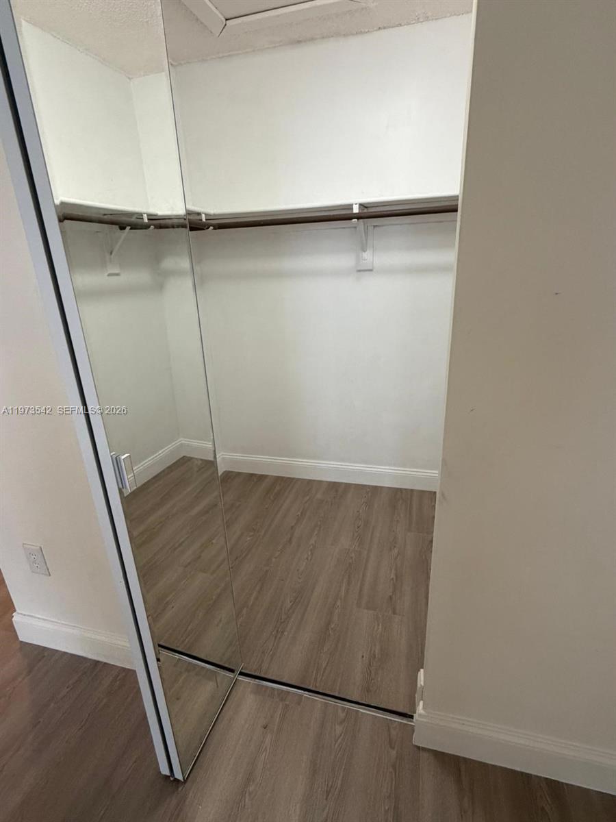 5252 Southwest 139th Place, Unit 5252 Miami, FL 33175 - Photo 14 of 18 a view of an empty room