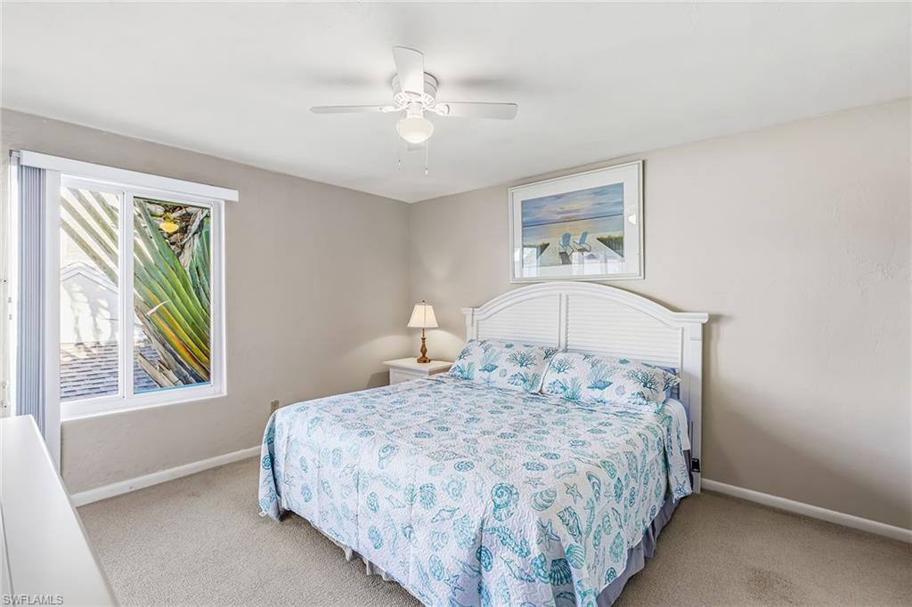2189 San Marco Road, Unit 3201 Marco Island, FL 34145 - Photo 16 of 27 a bedroom with a bed and a window