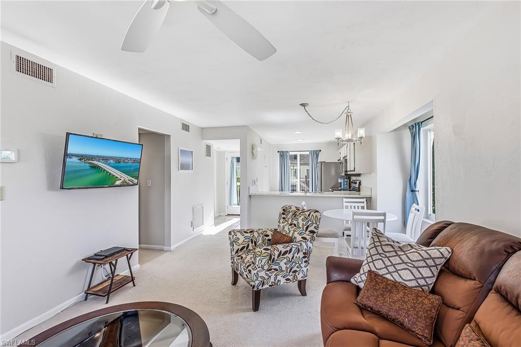 2189 San Marco Road, Unit 3201 Marco Island, FL 34145 - Photo 6 of 27 a living room with furniture