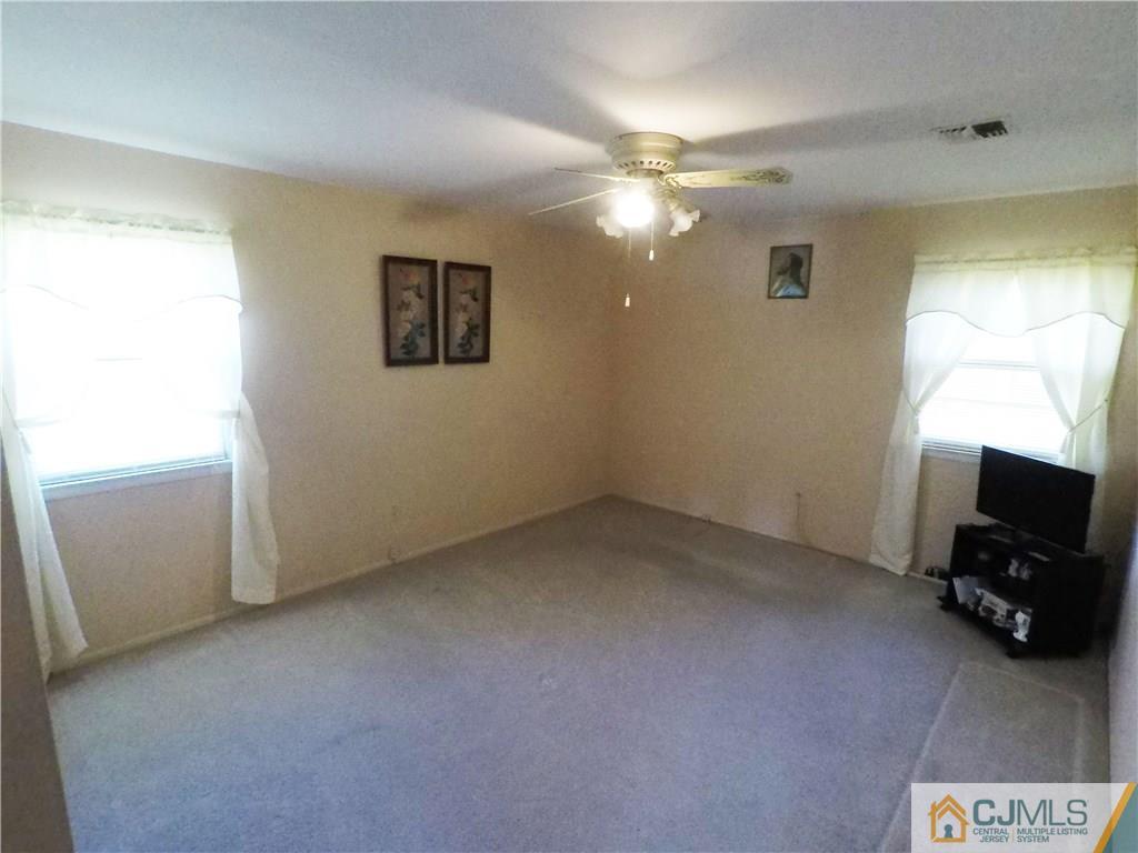 125 Georgetown Road Toms River, NJ 08757 - Photo 11 of 25 a view of a livingroom with a window