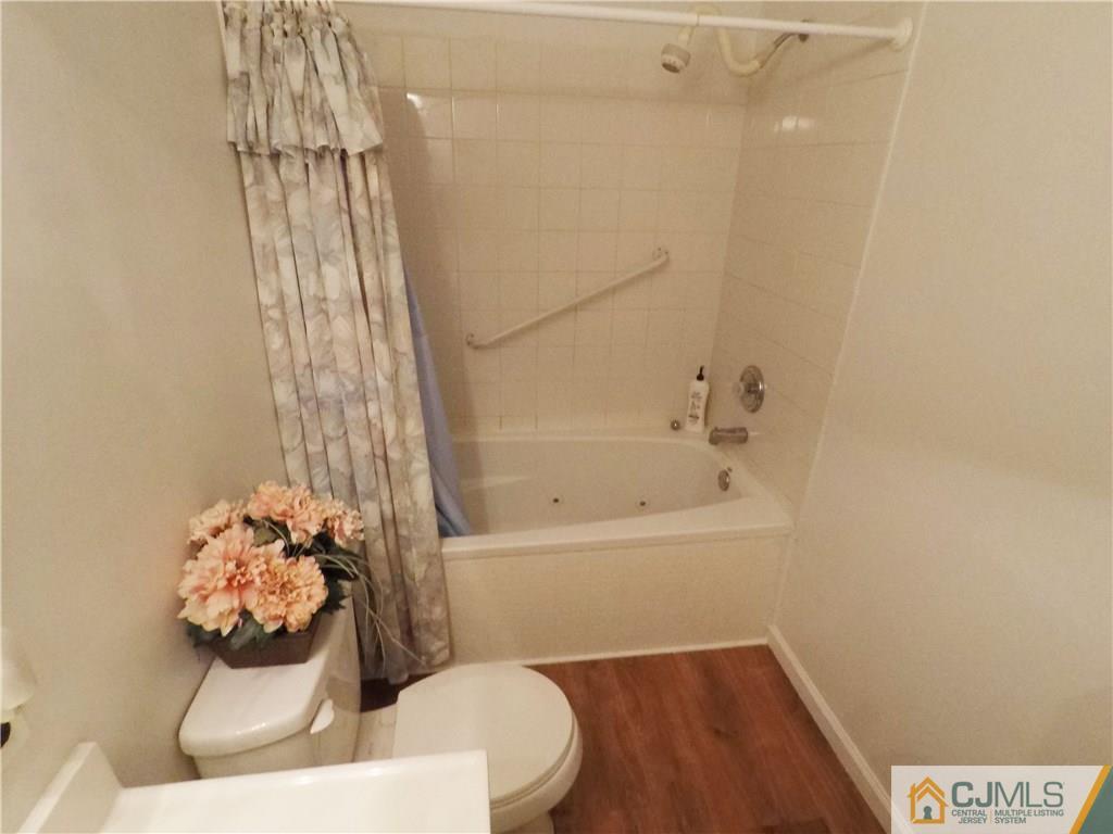 125 Georgetown Road Toms River, NJ 08757 - Photo 13 of 25 a bathroom with a bathtub and shower