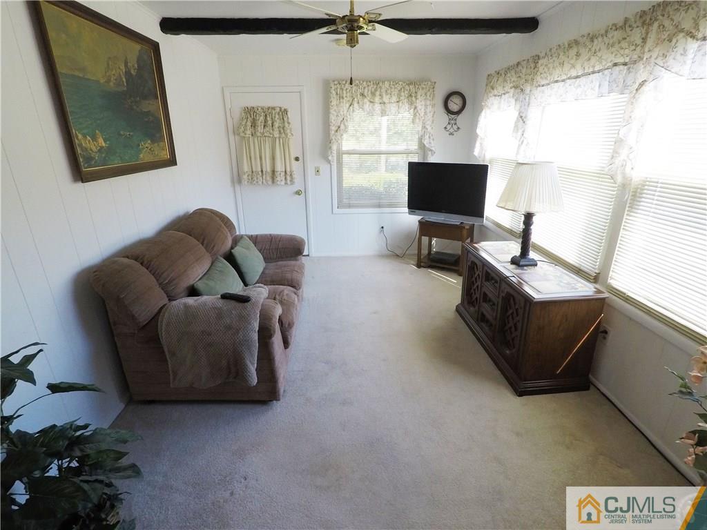 125 Georgetown Road Toms River, NJ 08757 - Photo 19 of 25 a living room with furniture and a window