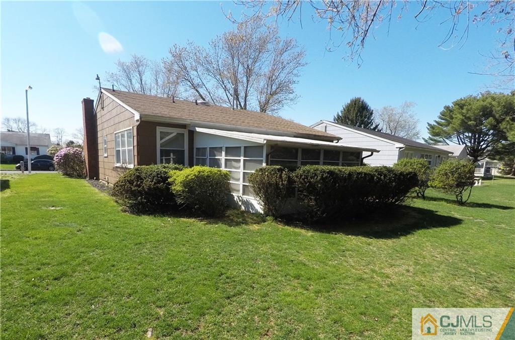 125 Georgetown Road Toms River, NJ 08757 - Photo 3 of 25 a view of house with yard and green space